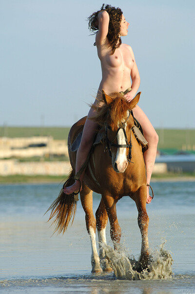 nude women on horseback